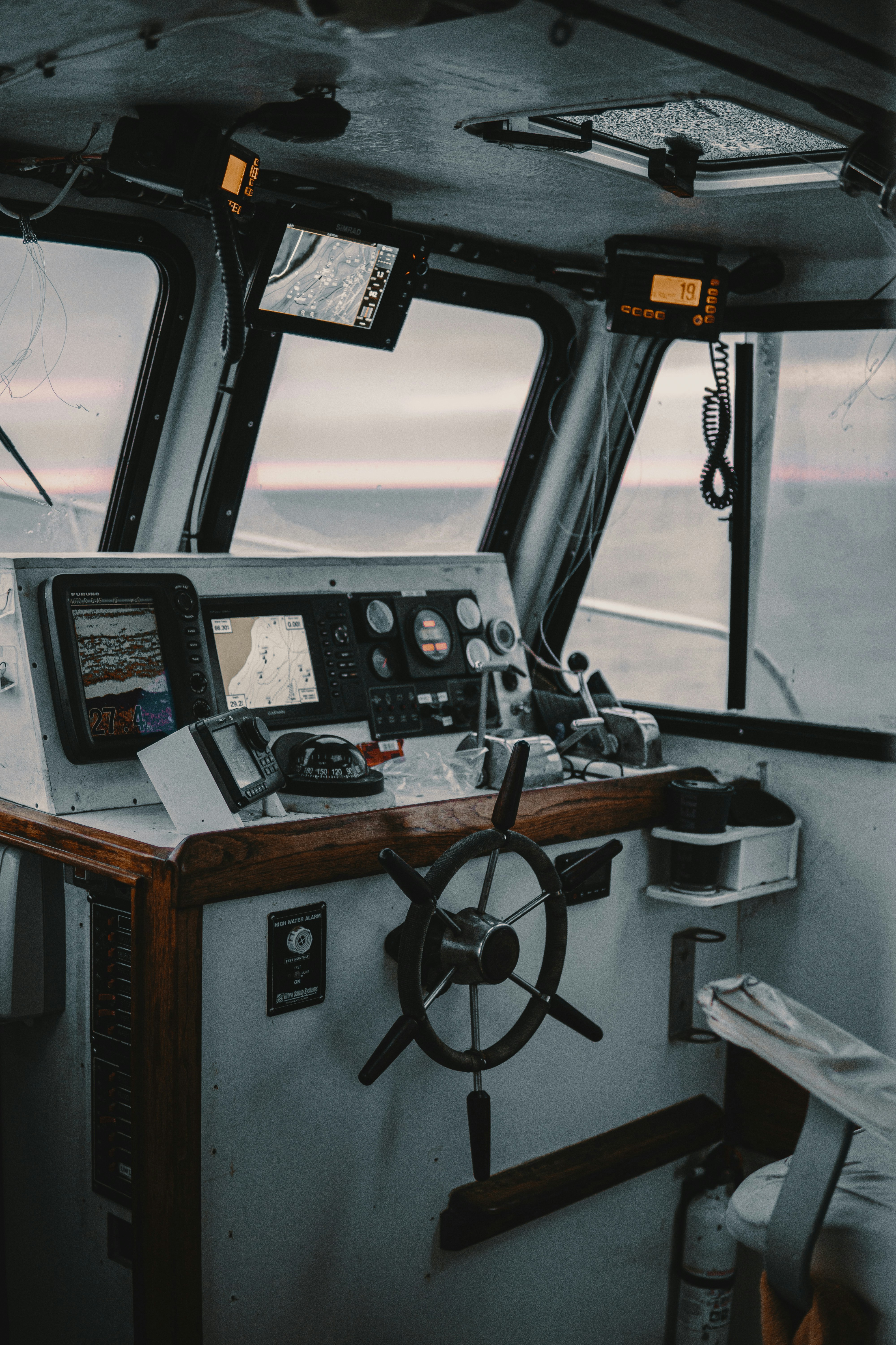 Wheel house from [Unsplash](https://unsplash.com/photos/boat-steering-wheel-rKG7y-VyQvc)
